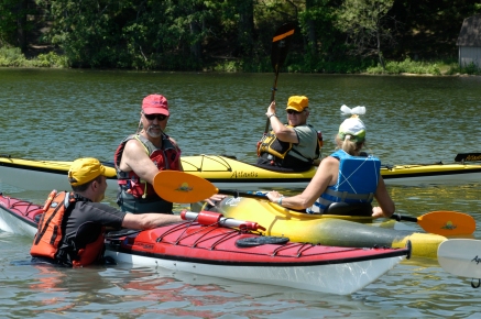 Instructor Michael Gray works the paddlers learning how to roll. Photo: Howard Meyerson