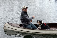 Mike Darga takes the pooch out for a paddle. Photo by Howard Meyerson.